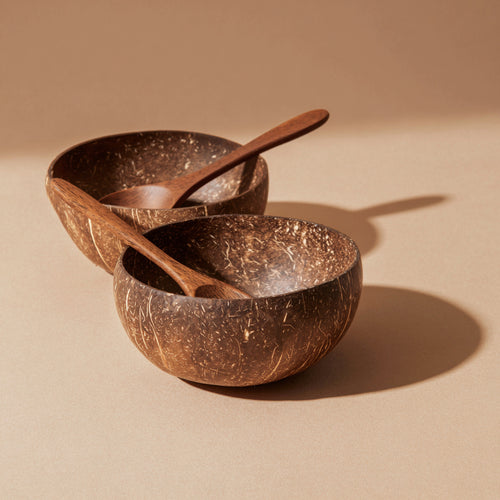 Handmade natural coconut bowls set of 2, side view showing texture