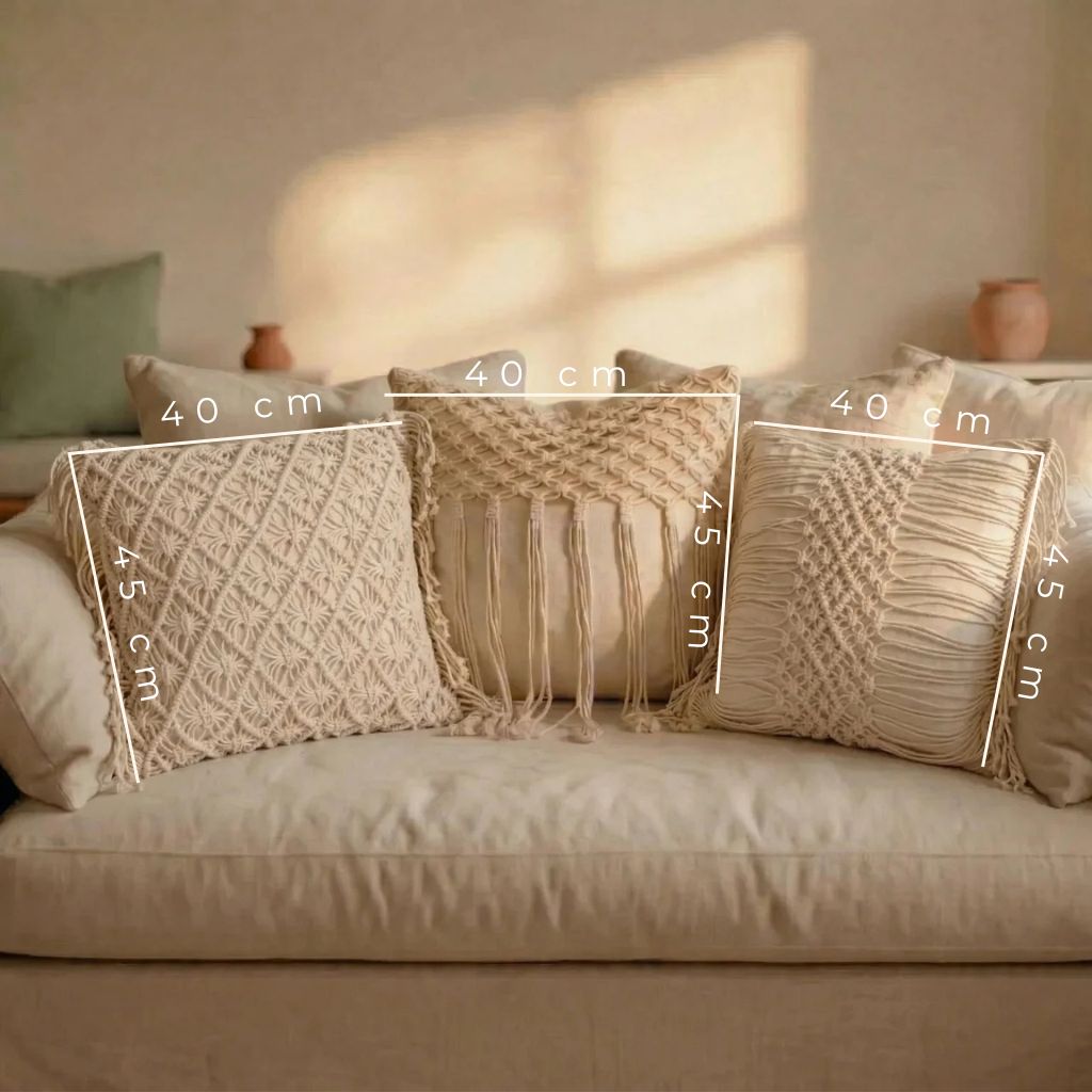 Full view of a hand-woven tassel pillowcase showing scale on a standard couch