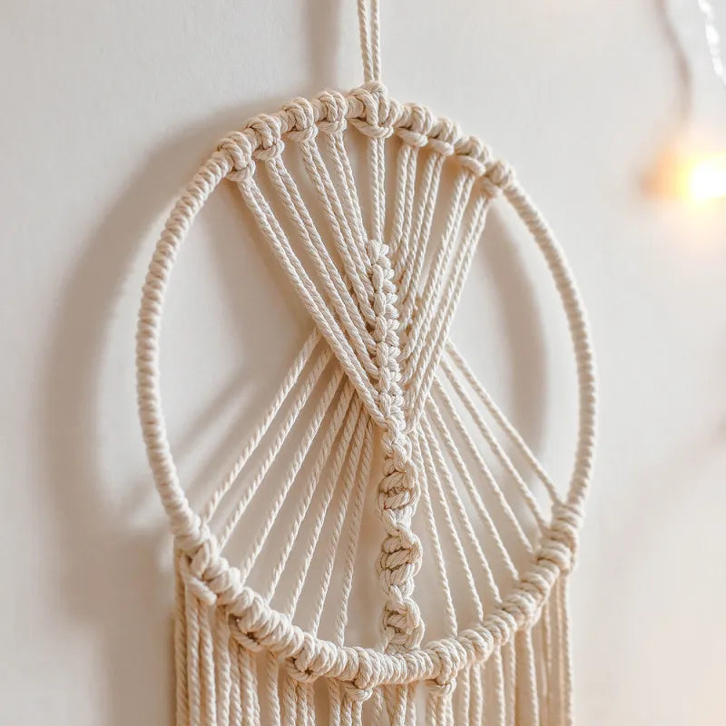 Close-up of handmade macrame knots showing intricate cotton rope texture